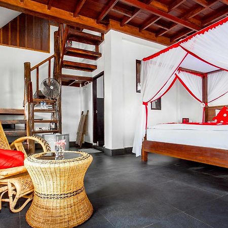 Ecotravel Cottages Bukit Lawang Esterno foto