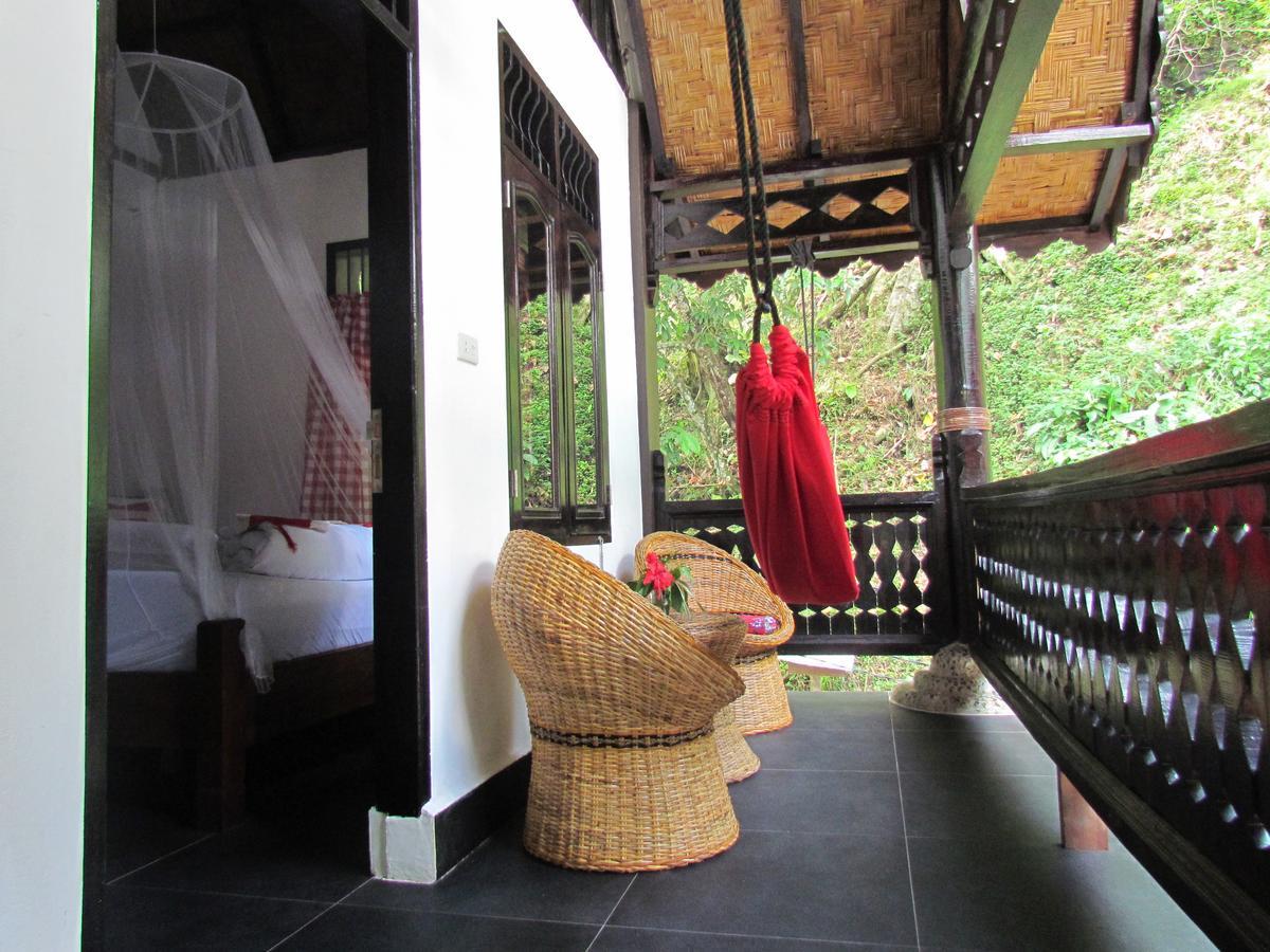Ecotravel Cottages Bukit Lawang Esterno foto