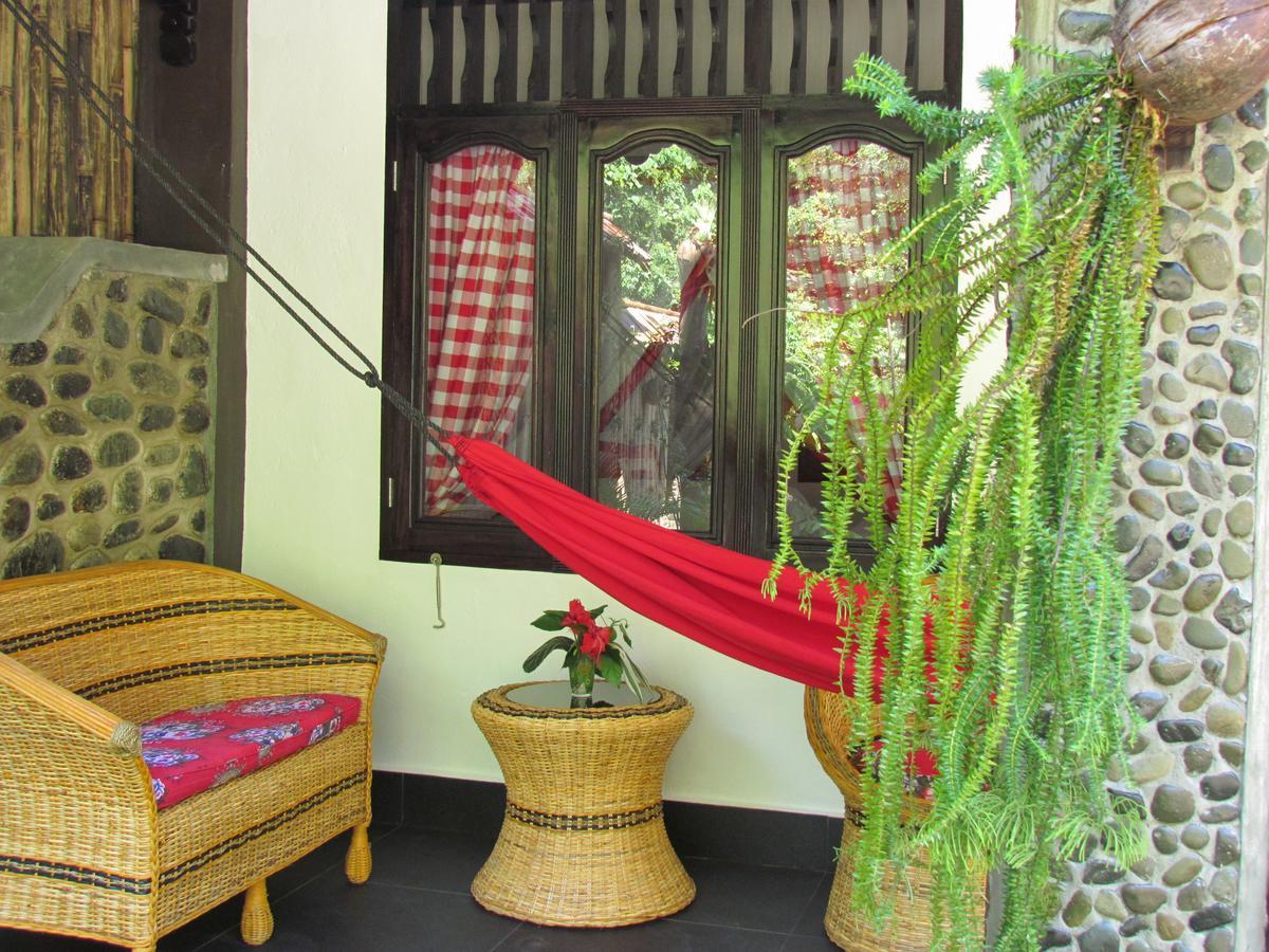 Ecotravel Cottages Bukit Lawang Esterno foto