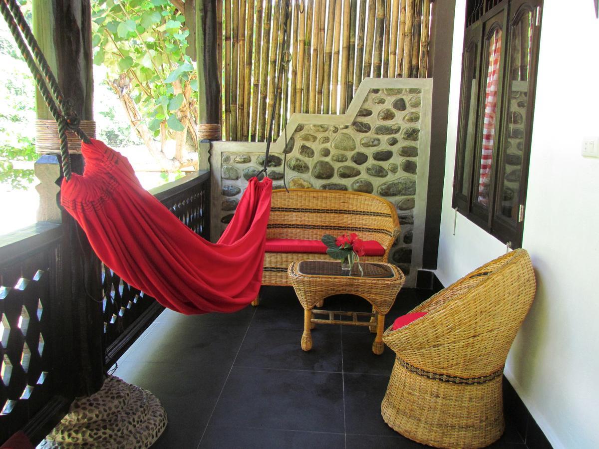 Ecotravel Cottages Bukit Lawang Esterno foto