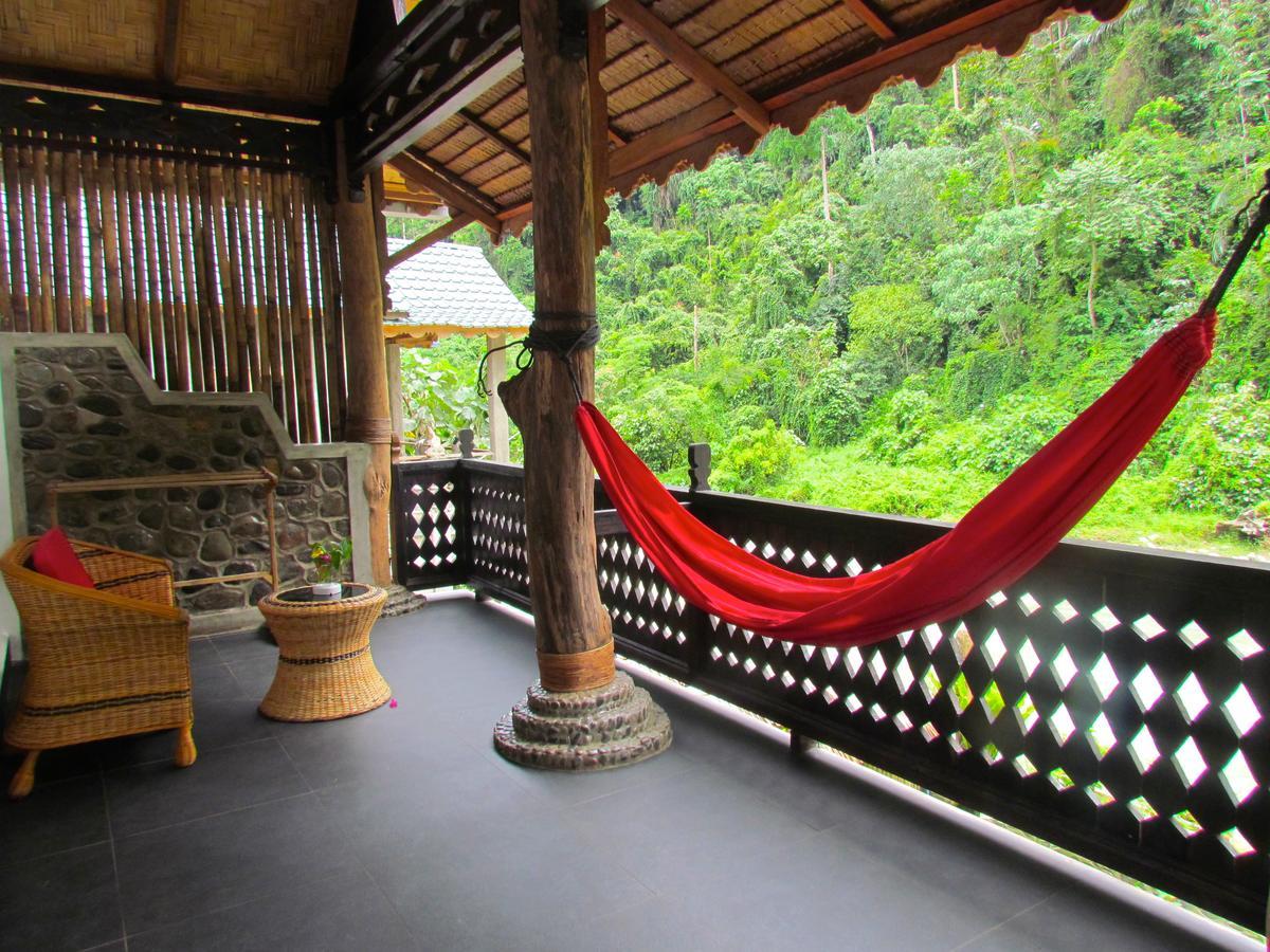 Ecotravel Cottages Bukit Lawang Esterno foto