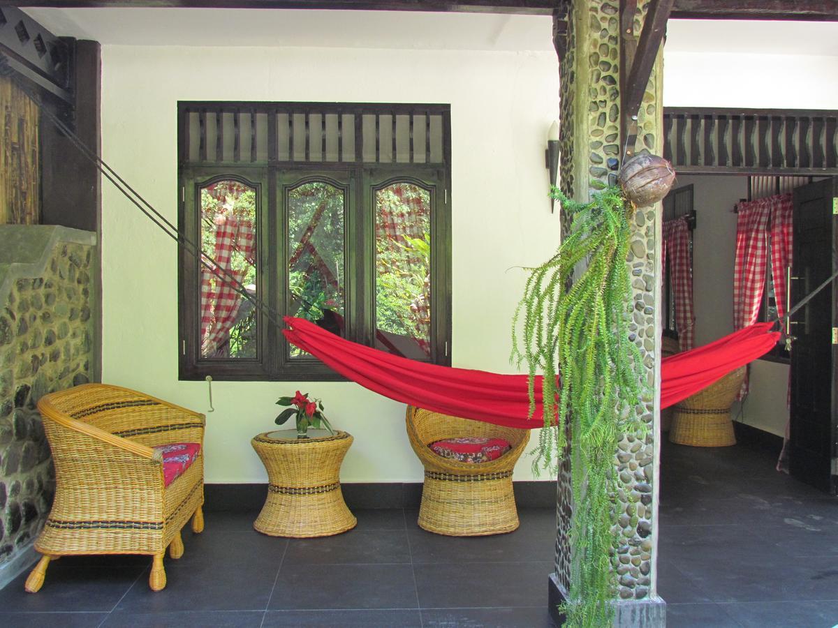 Ecotravel Cottages Bukit Lawang Esterno foto