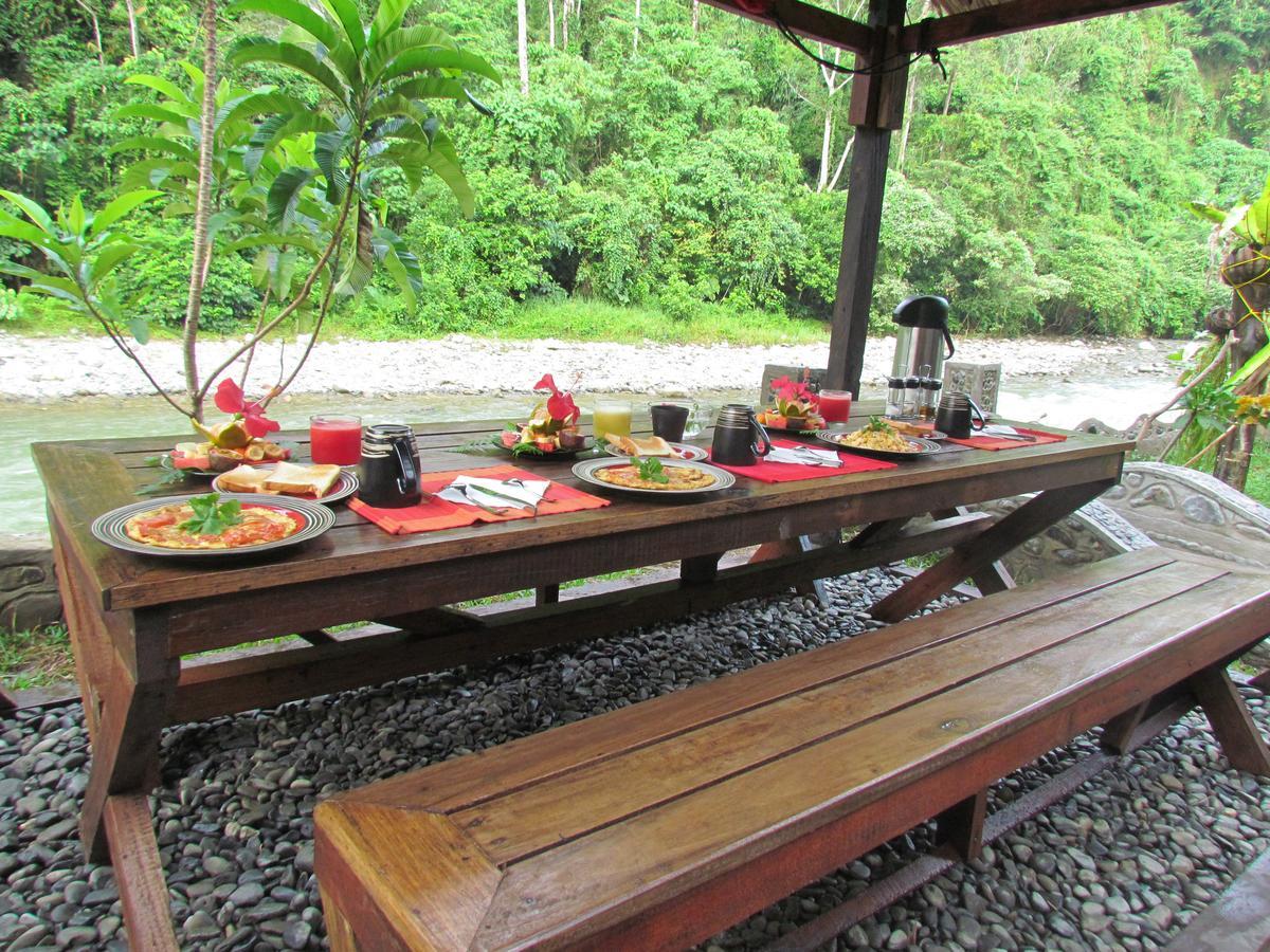 Ecotravel Cottages Bukit Lawang Esterno foto