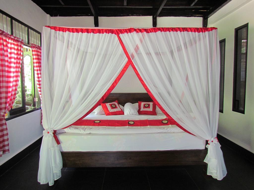 Ecotravel Cottages Bukit Lawang Esterno foto