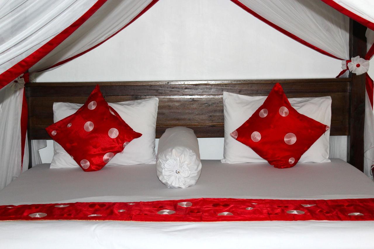Ecotravel Cottages Bukit Lawang Esterno foto
