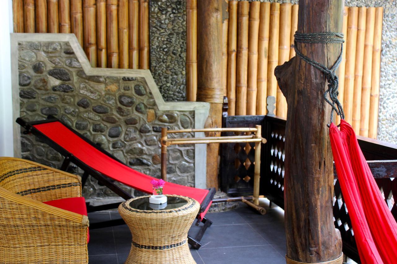 Ecotravel Cottages Bukit Lawang Esterno foto