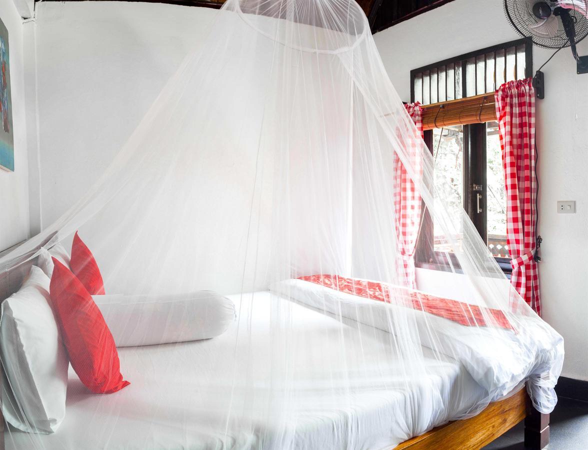 Ecotravel Cottages Bukit Lawang Esterno foto