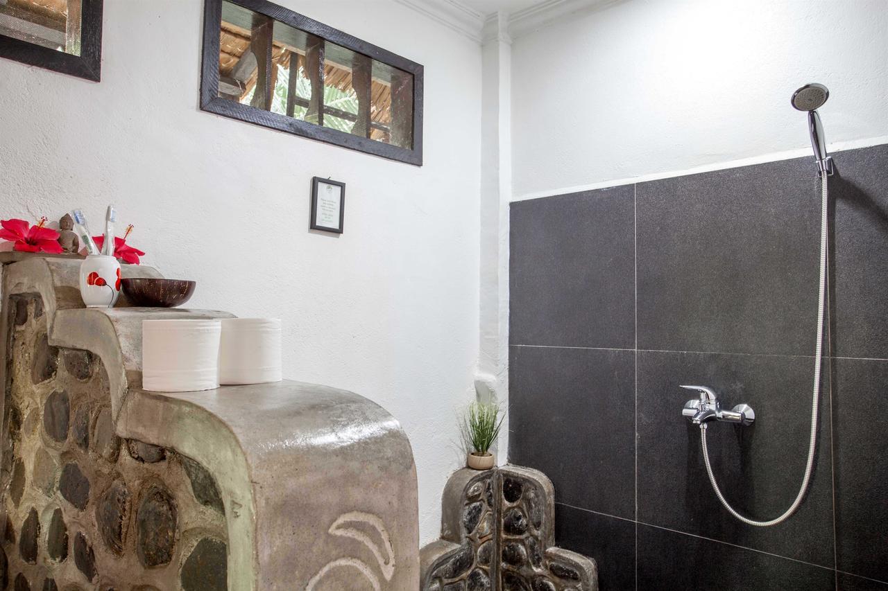 Ecotravel Cottages Bukit Lawang Esterno foto